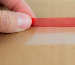 resealable finger lift
